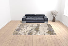 4' X 6' Gray Ivory And Gold Abstract Area Rug