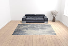 4' X 6' Gray Blue And Ivory Abstract Area Rug