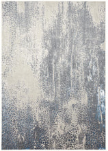 4' X 6' Gray Blue And Ivory Abstract Area Rug