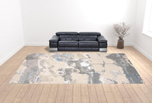 4' X 6' Ivory Gray And Blue Abstract Area Rug