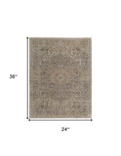 4' X 6' Brown Ivory And Tan Floral Power Loom Distressed Area Rug