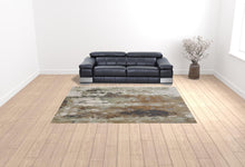 10' X 13' Blue Orange And Ivory Abstract Power Loom Area Rug