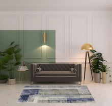 4' X 6' Blue Green And Ivory Abstract Power Loom Distressed Area Rug