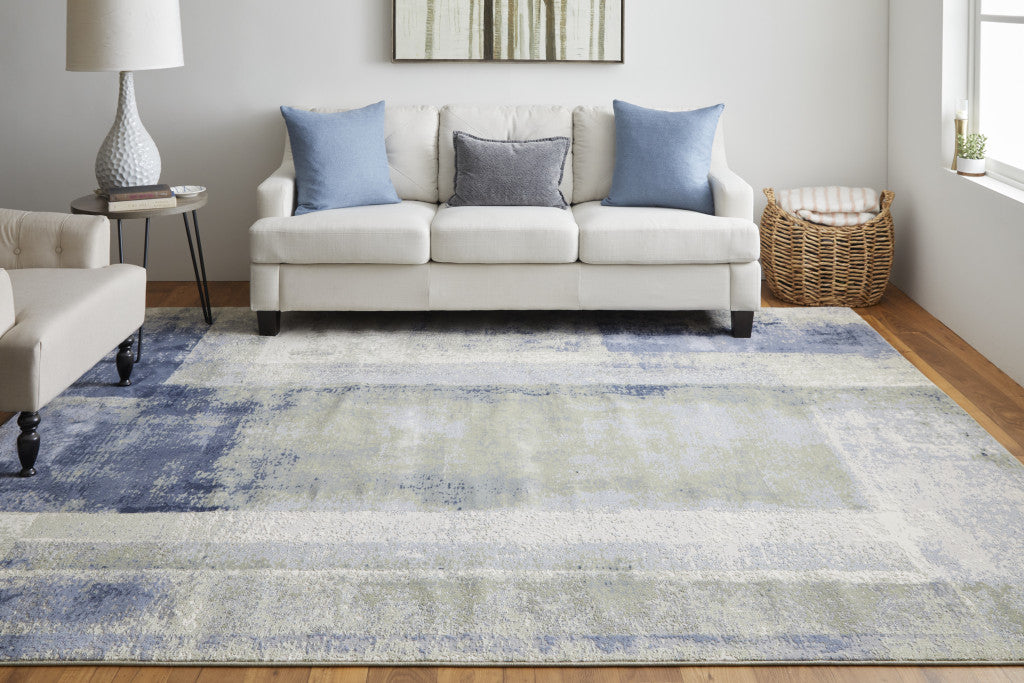4' X 6' Blue Green And Ivory Abstract Power Loom Distressed Area Rug