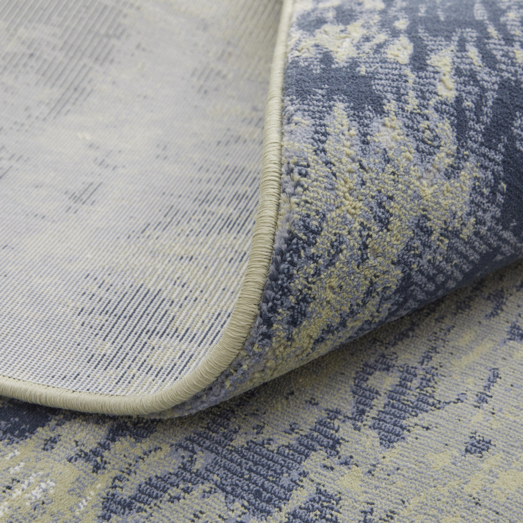 4' X 6' Blue Green And Ivory Abstract Power Loom Distressed Area Rug