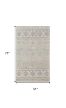 4' X 6' Ivory And Blue Geometric Power Loom Distressed Area Rug