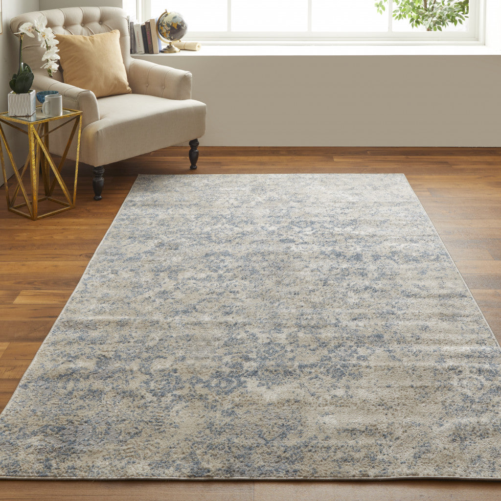 4' X 6' Blue And Ivory Abstract Power Loom Distressed Area Rug