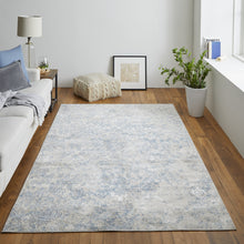 4' X 6' Blue And Ivory Abstract Power Loom Distressed Area Rug