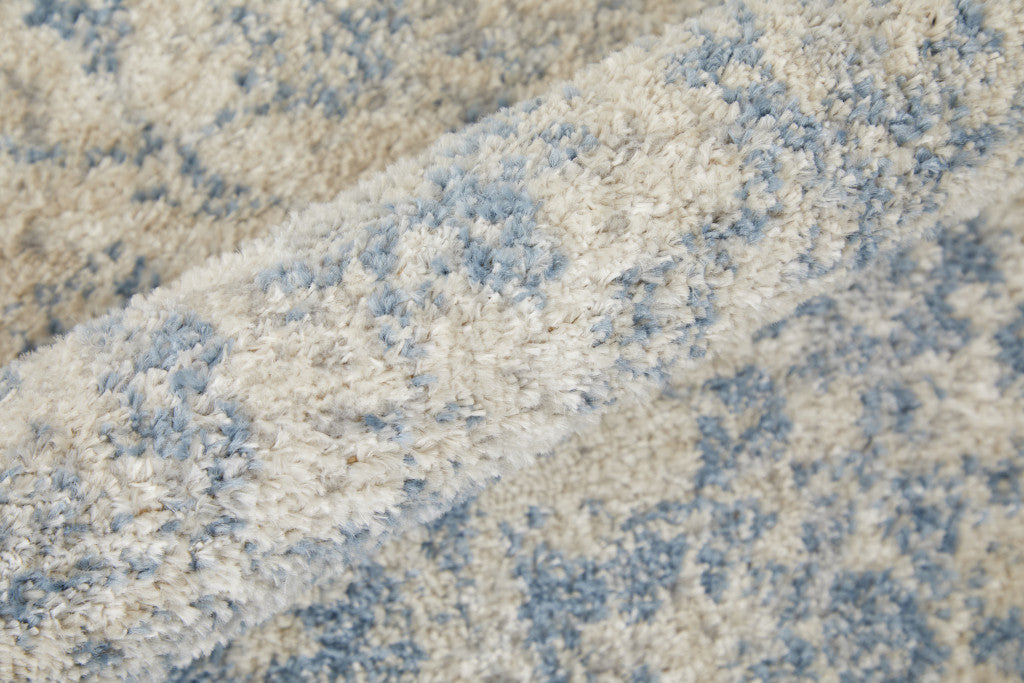 4' X 6' Blue And Ivory Abstract Power Loom Distressed Area Rug