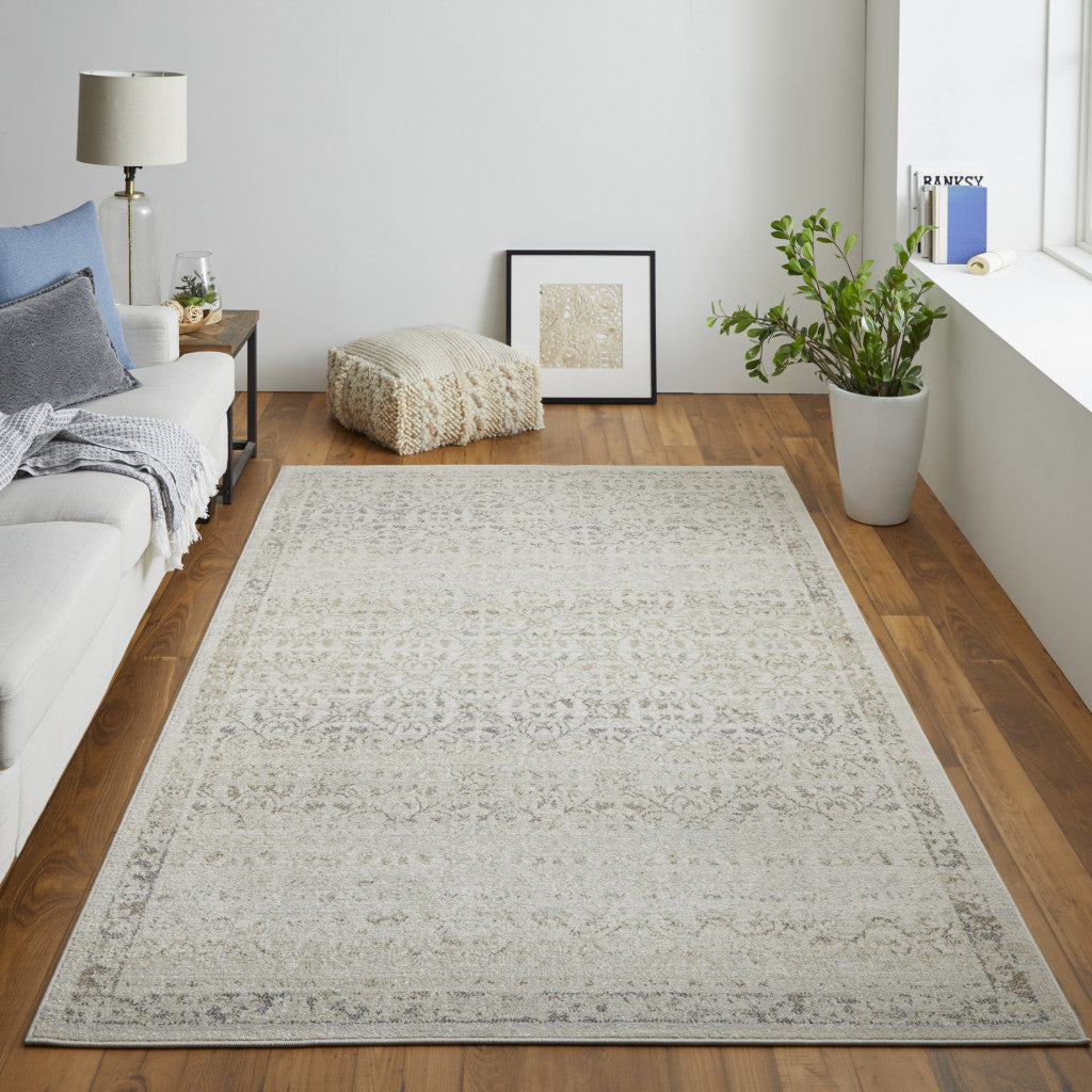 4' X 6' Ivory Tan And Gray Abstract Power Loom Distressed Area Rug