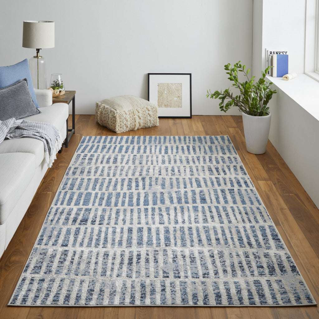5' X 8' Blue And Ivory Geometric Power Loom Distressed Area Rug