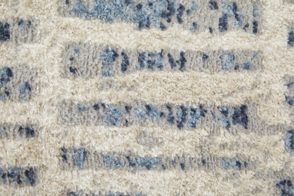 5' X 8' Blue And Ivory Geometric Power Loom Distressed Area Rug