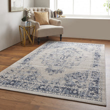 4' X 6' Ivory And Blue Floral Power Loom Distressed Area Rug