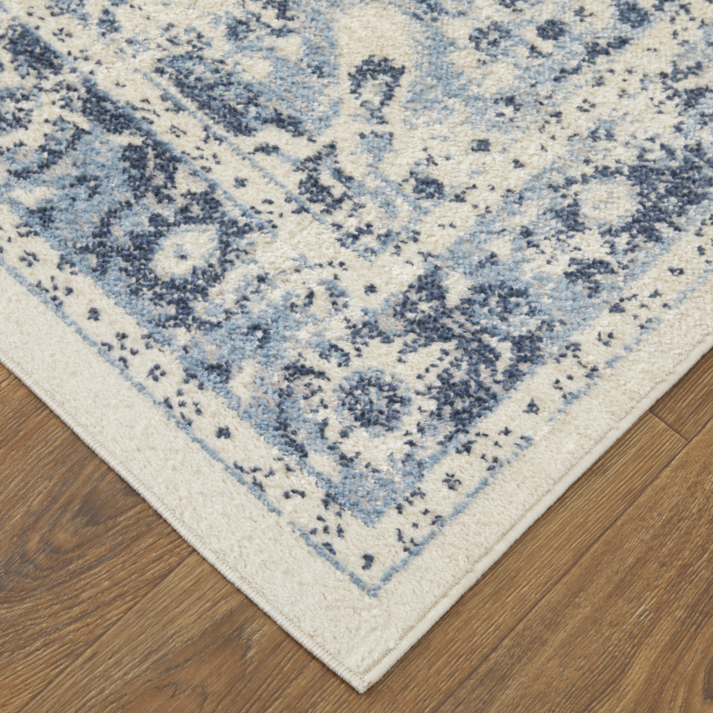4' X 6' Ivory And Blue Floral Power Loom Distressed Area Rug