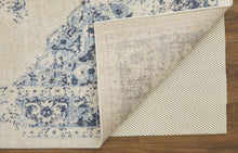4' X 6' Ivory And Blue Floral Power Loom Distressed Area Rug