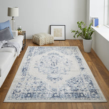 4' X 6' Ivory And Blue Floral Power Loom Distressed Area Rug