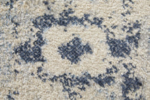 4' X 6' Ivory And Blue Floral Power Loom Distressed Area Rug