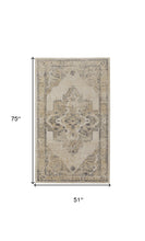 8' X 10' Blue And Ivory Floral Power Loom Distressed Area Rug
