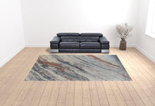 3' X 5' Ivory Orange And Blue Abstract Power Loom Stain Resistant Area Rug