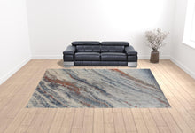 3' X 5' Ivory Orange And Blue Abstract Power Loom Stain Resistant Area Rug