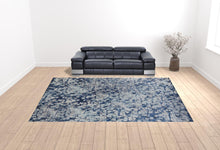 3' X 5' Blue And Ivory Abstract Power Loom Distressed Stain Resistant Area Rug