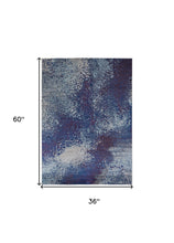 3' X 5' Blue Purple And Ivory Abstract Power Loom Stain Resistant Area Rug