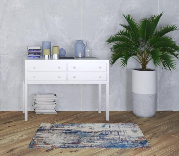 3' X 5' Ivory And Blue Abstract Power Loom Distressed Stain Resistant Area Rug