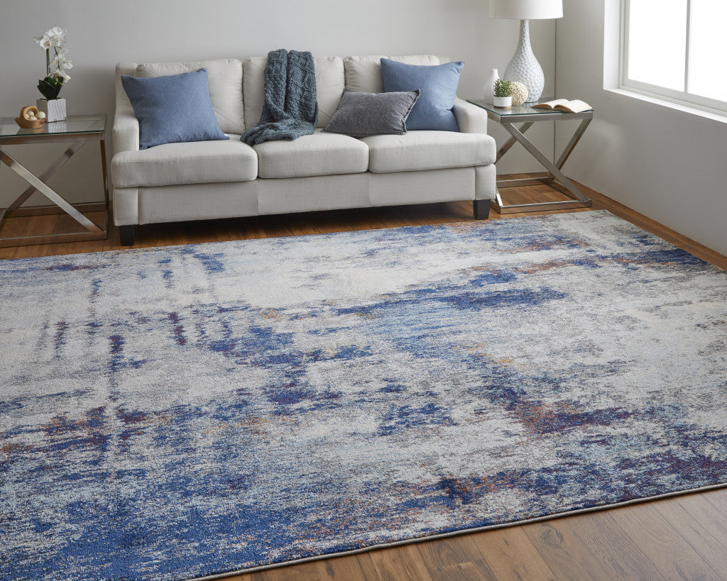 3' X 5' Ivory And Blue Abstract Power Loom Distressed Stain Resistant Area Rug