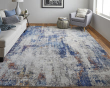 3' X 5' Ivory And Blue Abstract Power Loom Distressed Stain Resistant Area Rug