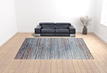 3' X 5' Blue Ivory And Orange Abstract Power Loom Stain Resistant Area Rug