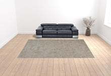 4' X 6' Gray And Taupe Abstract Hand Woven Area Rug