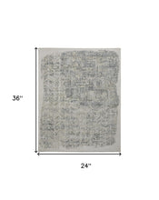 4' X 6' Green Blue And Ivory Abstract Hand Woven Distressed Area Rug