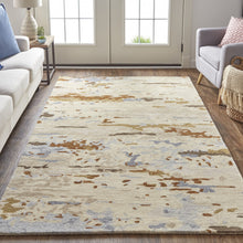 Tan And Blue Wool Abstract Tufted Handmade Stain Resistant Area Rug - 4' x 6'