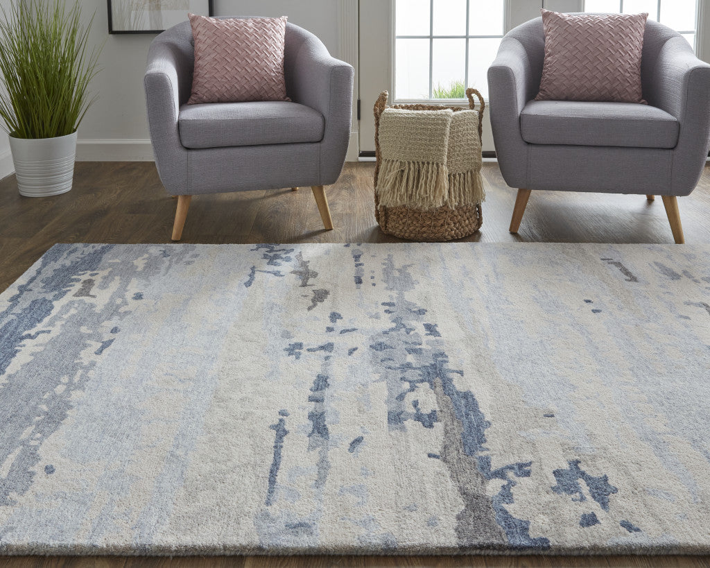 Blue Gray And Ivory Wool Abstract Tufted Handmade Stain Resistant Area Rug - 4' x 6'
