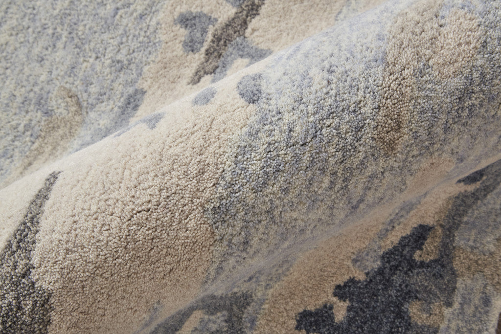 Blue Gray And Ivory Wool Abstract Tufted Handmade Stain Resistant Area Rug - 4' x 6'