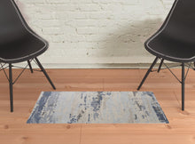 Blue Gray And Ivory Wool Abstract Tufted Handmade Stain Resistant Area Rug - 4' x 6'