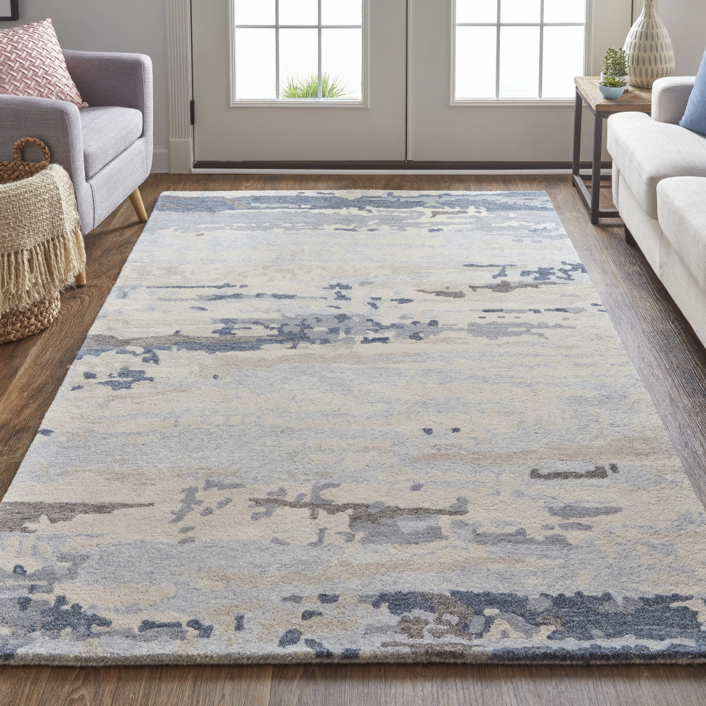Blue Gray And Ivory Wool Abstract Tufted Handmade Stain Resistant Area Rug - 4' x 6'