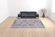 4' X 6' Gray Orange And Blue Geometric Power Loom Distressed Stain Resistant Area Rug