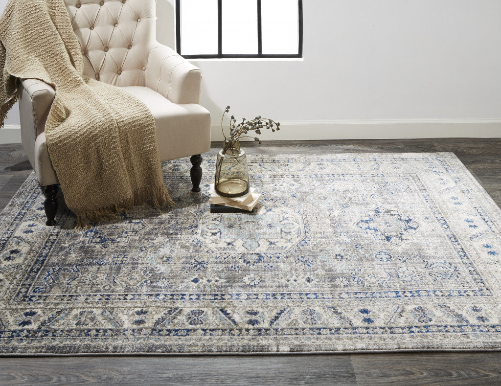 Taupe Gray And Blue Floral Stain Resistant Area Rug - 5' x 8'