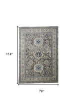 5' X 8' Gray Brown And Blue Floral Stain Resistant Area Rug