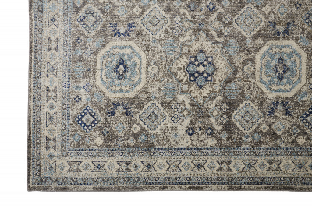 5' X 8' Gray Brown And Blue Floral Stain Resistant Area Rug
