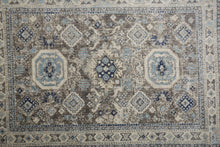 5' X 8' Gray Brown And Blue Floral Stain Resistant Area Rug