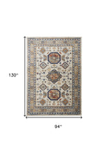 5' X 8' Gray Brown And Blue Floral Stain Resistant Area Rug