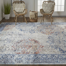 5' X 8' Blue Ivory And Red Floral Power Loom Distressed Stain Resistant Area Rug