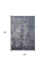 Blue Gray And Ivory Striped Power Loom Distressed Area Rug 4' x 6'