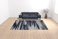 4' X 6' Ivory Blue And Gray Abstract Power Loom Distressed Area Rug