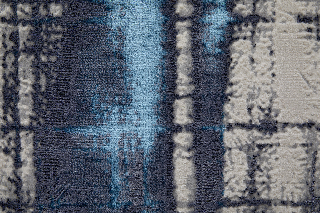 4' X 6' Ivory Blue And Gray Abstract Power Loom Distressed Area Rug