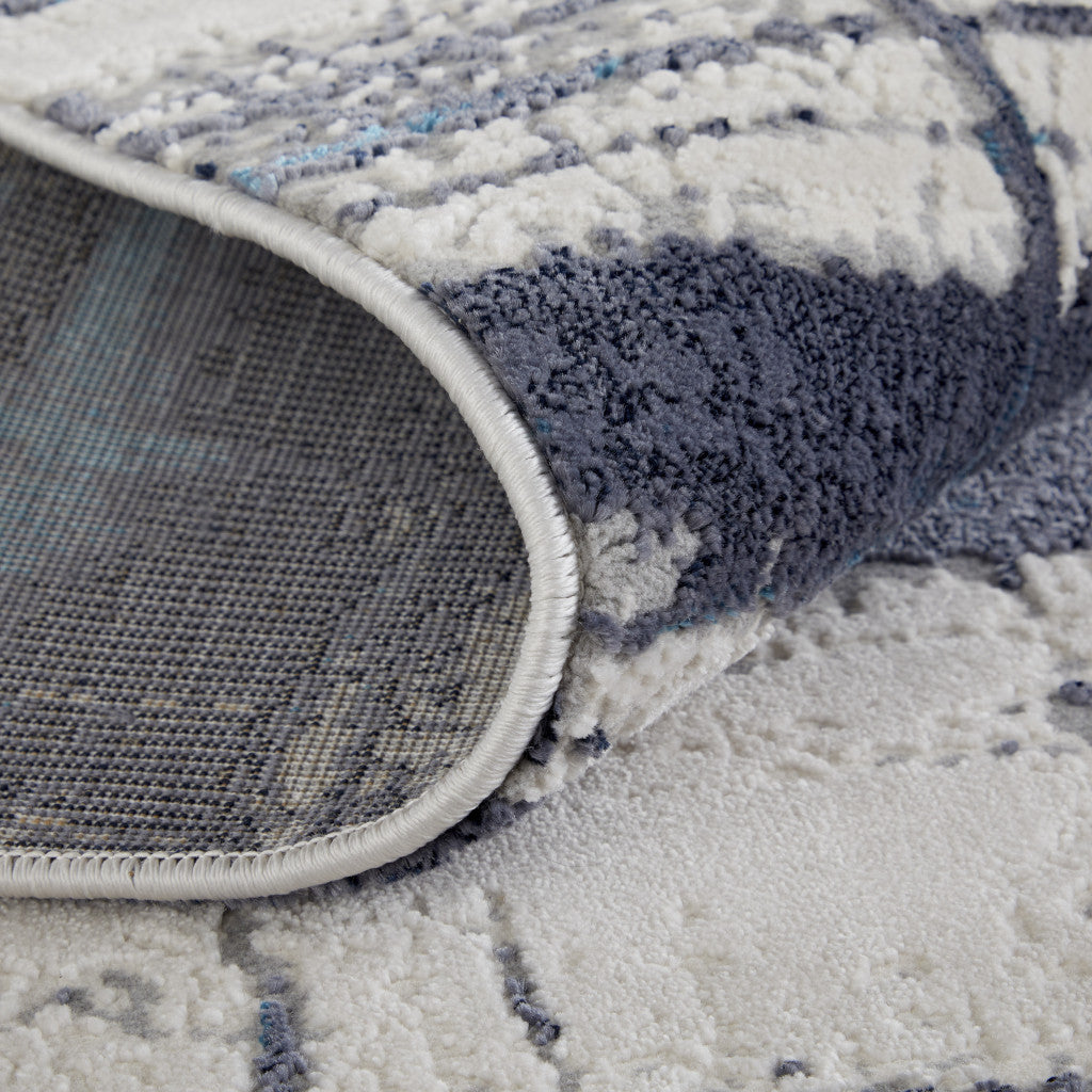 4' X 6' Ivory Blue And Gray Abstract Power Loom Distressed Area Rug