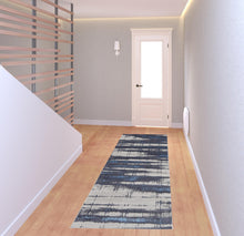 4' X 6' Ivory Blue And Gray Abstract Power Loom Distressed Area Rug