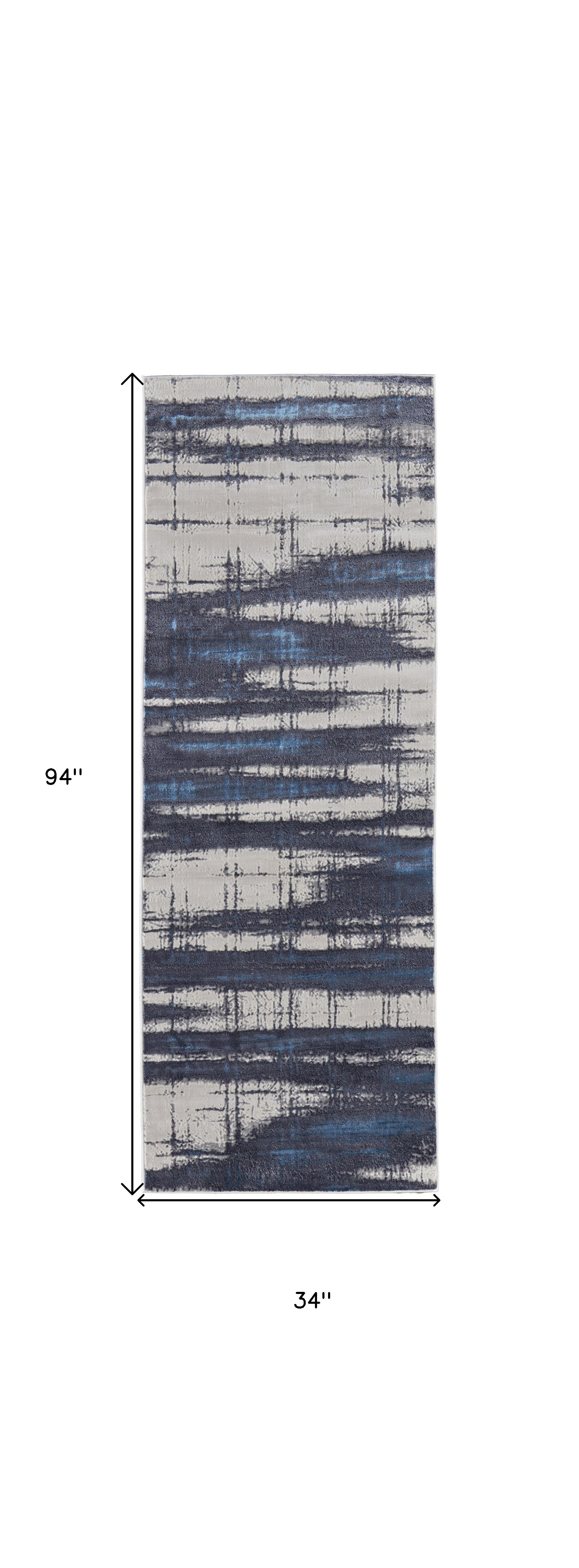 4' X 6' Ivory Blue And Gray Abstract Power Loom Distressed Area Rug